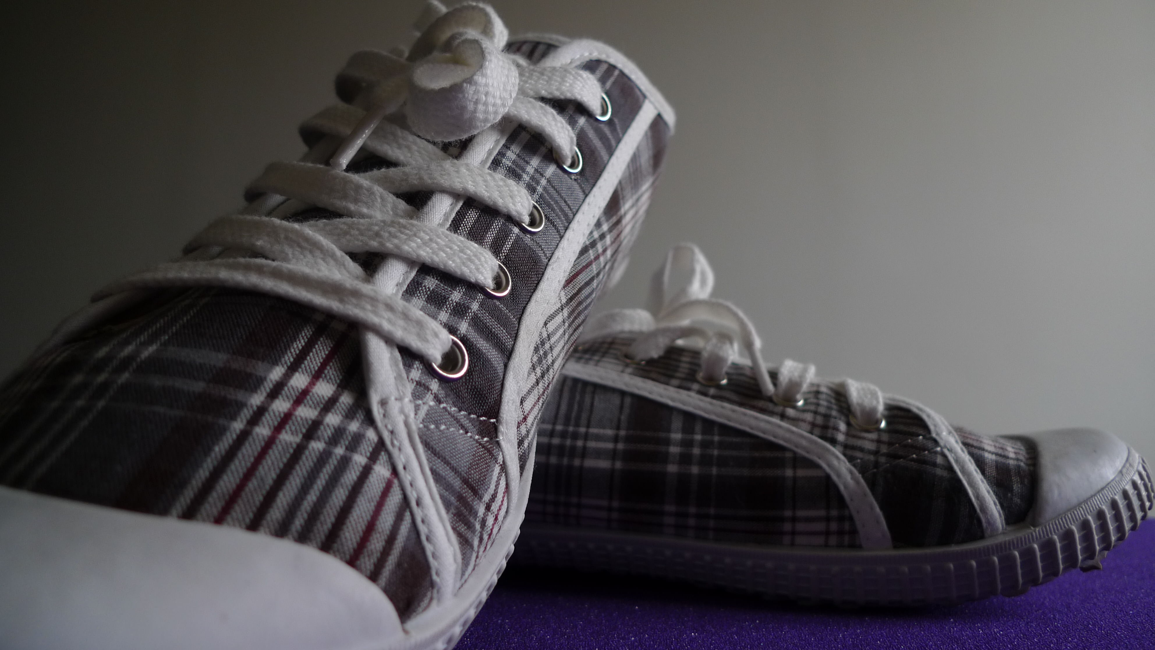 Black and white plimsolls