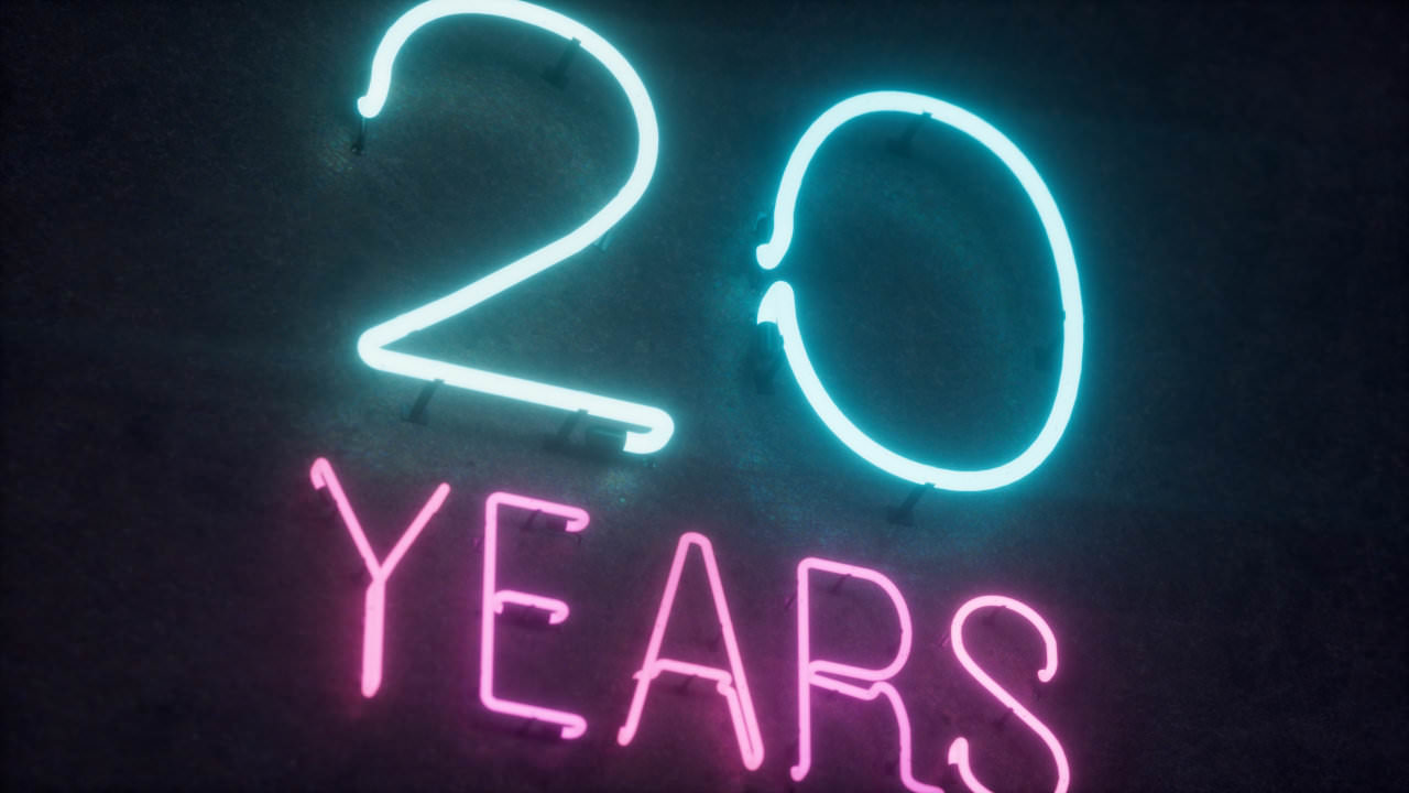 A neon sign displaying &lsquo;20&rsquo; in blue and &lsquo;Years&rsquo; in pink