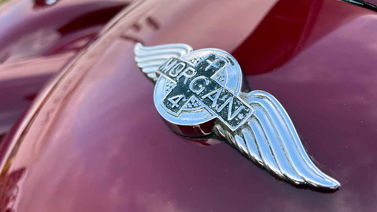 Close up of a Morgan car logo