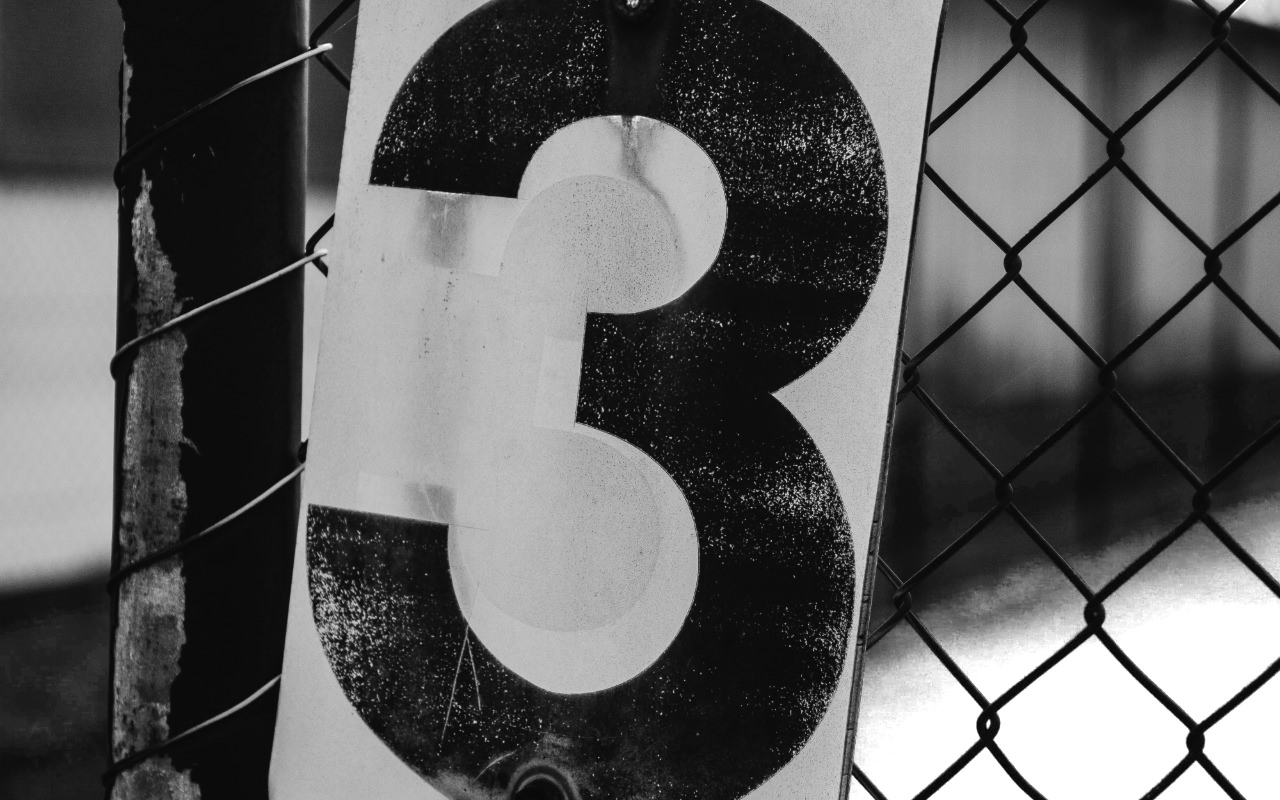 3 sign in black and white