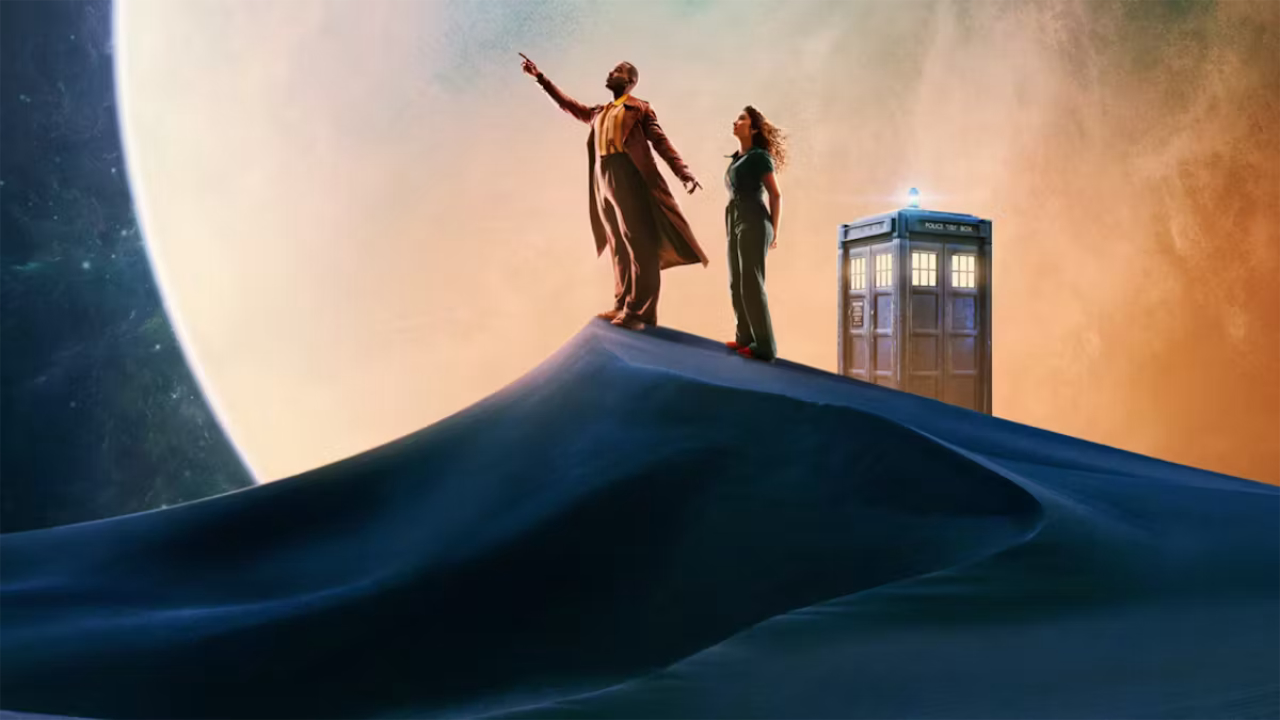 A promotional image for the 15th series of Doctor Who featuring Ncuti Gatwa as the Doctor and Varada Sethu as Belinda, both are standing on a hill next to the TARDIS looking up into the skies