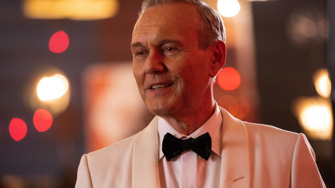 A still photo from the first series of Ted Lasso, featuring Anthony Head as Rupert Walton, dressed in a smart cream suit